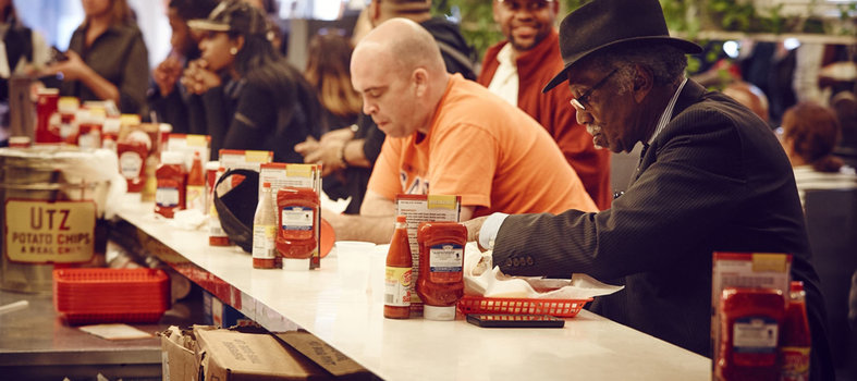 Down a chili-smothered half-smoke at Ben's Chili Bowl